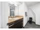Well-appointed bathroom with a granite countertop vanity and modern fixtures, providing a clean and stylish space at 7215 Ullom Dr, Las Vegas, NV 89118