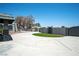 Circular driveway leads to a unique home, complemented by manicured landscaping at 7215 Ullom Dr, Las Vegas, NV 89118