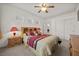 Inviting bedroom featuring a comfortable bed, side tables with lamps, and ample closet space at 8021 Glacier Falls St, North Las Vegas, NV 89085