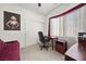 Bedroom with a desk, office chair, window, closet, and decor at 8021 Glacier Falls St, North Las Vegas, NV 89085