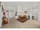 Open-concept dining room showcasing a wooden table and neutral decor at 8021 Glacier Falls St, North Las Vegas, NV 89085