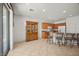 Bright kitchen with a large island, bar stools, and plenty of cabinet space for storage solutions at 8021 Glacier Falls St, North Las Vegas, NV 89085