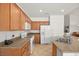 Well-equipped kitchen with granite countertops, stainless steel appliances, and ample cabinet space at 8021 Glacier Falls St, North Las Vegas, NV 89085
