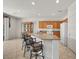 Bright kitchen with granite island, breakfast bar, and ample counter space, perfect for casual dining at 8021 Glacier Falls St, North Las Vegas, NV 89085