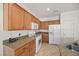 Functional kitchen featuring granite countertops, modern appliances, and a bright, airy atmosphere at 8021 Glacier Falls St, North Las Vegas, NV 89085