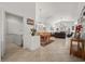 Open-concept living space featuring formal dining, laundry room, and connected common areas at 8021 Glacier Falls St, North Las Vegas, NV 89085