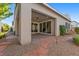 Backyard view of the covered patio, landscaping, and exterior elevation at 816 Stannard Ct, Henderson, NV 89052