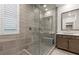 Luxurious bathroom featuring a spacious glass-enclosed shower with a built-in bench at 816 Stannard Ct, Henderson, NV 89052