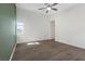 Cozy bedroom with a ceiling fan and hardwood floors at 816 Stannard Ct, Henderson, NV 89052