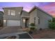 Charming two-story home with a well-maintained front yard and attached two-car garage at 816 Stannard Ct, Henderson, NV 89052