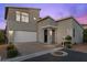Beautiful home with a two-car garage and manicured landscaping, offering curb appeal at 816 Stannard Ct, Henderson, NV 89052