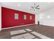 Spacious living room features high ceilings, modern lighting, and sleek hardwood flooring at 816 Stannard Ct, Henderson, NV 89052
