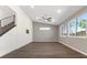 Bright living room with high ceilings, hardwood floors, and large windows for natural light at 816 Stannard Ct, Henderson, NV 89052