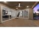 Covered patio with stone pavers and view through sliding glass doors to interior at 816 Stannard Ct, Henderson, NV 89052