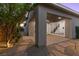 Covered patio with stone pavers and views to the home's backyard at 816 Stannard Ct, Henderson, NV 89052
