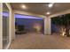 Covered patio with stone pavers and views to the backyard at 816 Stannard Ct, Henderson, NV 89052