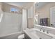 Clean bathroom with tub and shower, offering a relaxing space at 8353 Lower Trailhead Ave, Las Vegas, NV 89113