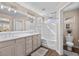 Bright bathroom with dual sinks, bathtub, and ample counter space, creating a functional design at 8353 Lower Trailhead Ave, Las Vegas, NV 89113
