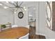 Bright dining area showcasing a round table with stylish chairs and modern lighting at 8353 Lower Trailhead Ave, Las Vegas, NV 89113