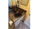 This bathroom offers a decorative sink atop a granite countertop and decorative cabinet at 8761 Rainbow Ridge Dr, Las Vegas, NV 89117