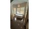 Bright bathroom featuring a modern tub under a window, creating a serene and relaxing atmosphere at 8761 Rainbow Ridge Dr, Las Vegas, NV 89117