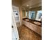 Bathroom vanity with granite countertops, double sinks, and stylish tile flooring, providing a luxurious feel at 8761 Rainbow Ridge Dr, Las Vegas, NV 89117