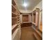 Spacious walk-in closet with custom shelving and ample storage space to keep your wardrobe organized at 8761 Rainbow Ridge Dr, Las Vegas, NV 89117