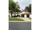 Charming two-story home with a well-manicured lawn and a three-car garage, showcasing curb appeal at 8761 Rainbow Ridge Dr, Las Vegas, NV 89117