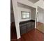 Hallway with built-in cabinets and granite countertop, leading to other rooms in the house at 8761 Rainbow Ridge Dr, Las Vegas, NV 89117