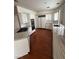 Modern kitchen with stainless steel appliances, granite countertops, and ample cabinet space at 8761 Rainbow Ridge Dr, Las Vegas, NV 89117