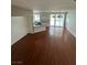 Open-concept dining and kitchen area featuring stainless steel appliances and a breakfast bar at 8761 Rainbow Ridge Dr, Las Vegas, NV 89117