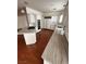 Modern kitchen featuring granite countertops, stainless steel appliances, and white cabinetry at 8761 Rainbow Ridge Dr, Las Vegas, NV 89117