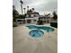 Inviting backyard showcasing a pool, spa, and covered patio perfect for outdoor relaxation and entertaining at 8761 Rainbow Ridge Dr, Las Vegas, NV 89117