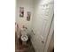 Cozy bathroom featuring neutral paint, artwork, and a convenient grab bar at 901 Sulphur Springs Ln # 101, Las Vegas, NV 89128