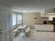 Dining area featuring a bright breakfast nook, white cabinets, and countertop at 901 Sulphur Springs Ln # 101, Las Vegas, NV 89128