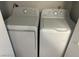 Convenient laundry closet with a stacked washer and dryer at 901 Sulphur Springs Ln # 101, Las Vegas, NV 89128