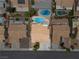 Stunning aerial view of a residential property featuring a private backyard pool at 920 Serpentina Ave, Las Vegas, NV 89123