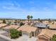 Expansive aerial view of a residential neighborhood showcasing well-maintained homes and desert landscaping at 920 Serpentina Ave, Las Vegas, NV 89123