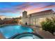 Backyard pool at dusk offers a relaxing atmosphere at 920 Serpentina Ave, Las Vegas, NV 89123