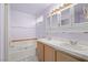 Bathroom with double sink vanity, tiled floor, shower and bathtub combination at 920 Serpentina Ave, Las Vegas, NV 89123