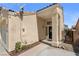 Close up of the front entrance and desert style front yard at 920 Serpentina Ave, Las Vegas, NV 89123