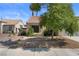 Charming single-story home featuring a desert landscape and a classic tile roof at 920 Serpentina Ave, Las Vegas, NV 89123