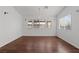 The living room offers an open floorplan, hardwood floors and abundant natural light at 920 Serpentina Ave, Las Vegas, NV 89123