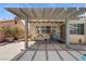 Covered patio with view of the backyard pool at 920 Serpentina Ave, Las Vegas, NV 89123