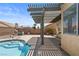 View of the pool and covered patio at 920 Serpentina Ave, Las Vegas, NV 89123