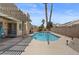 A covered patio overlooks the backyard pool at 920 Serpentina Ave, Las Vegas, NV 89123