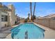 Full view of the beautiful in-ground backyard pool at 920 Serpentina Ave, Las Vegas, NV 89123