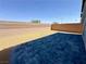 Private backyard featuring stone pavers, gravel, and block wall for a serene outdoor living space at 9348 Wildcat Peak St, Las Vegas, NV 89178