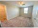 Neutral bedroom with carpeting, standard closet, and ceiling fan at 9348 Wildcat Peak St, Las Vegas, NV 89178
