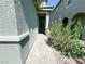 Charming front entrance with a covered porch and neat landscaping at 9348 Wildcat Peak St, Las Vegas, NV 89178